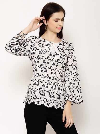 Floral Embroidered Tie-Up Neck Flared Sleeve Cotton Peplum Top